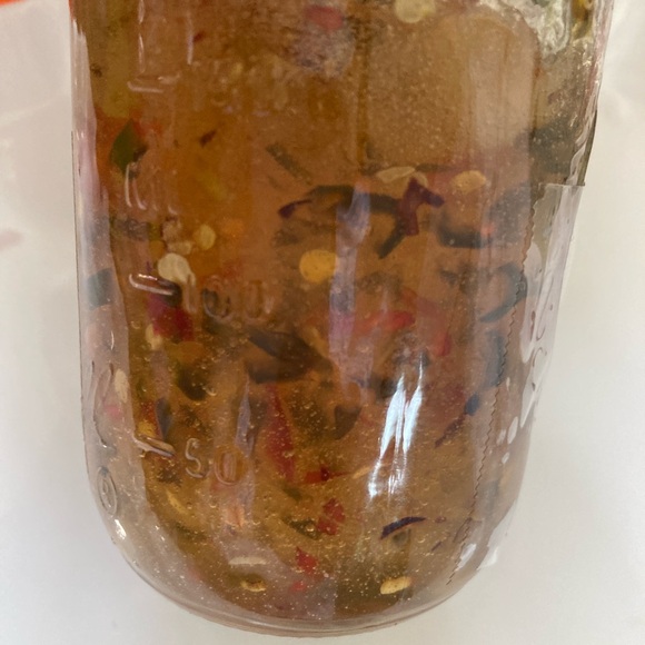 One half pint jar of hot pepper jelly from Yellow Flower Farm. Scrumptious. - Picture 3 of 5